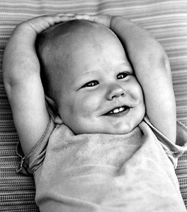 Seattle baby photography.  A Seattle baby relaxes for his Seattle baby photography portrait.